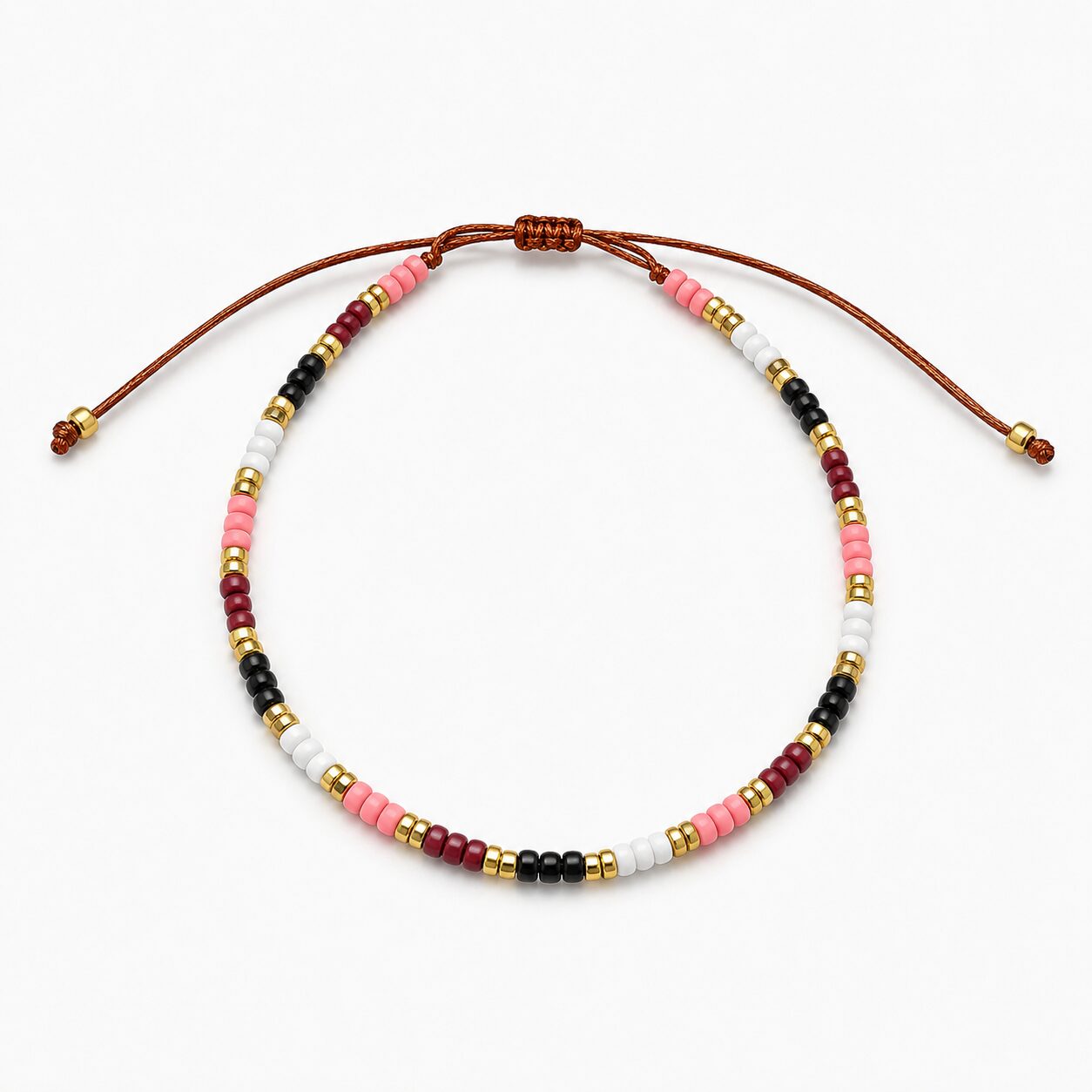 Pulsera Ajustable de Cuentas Rosa, Blanco y Negro con Detalles Dorados